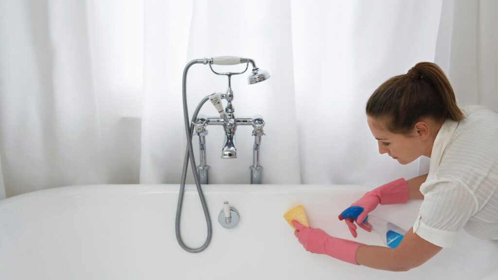 scrubbing bathtub surface