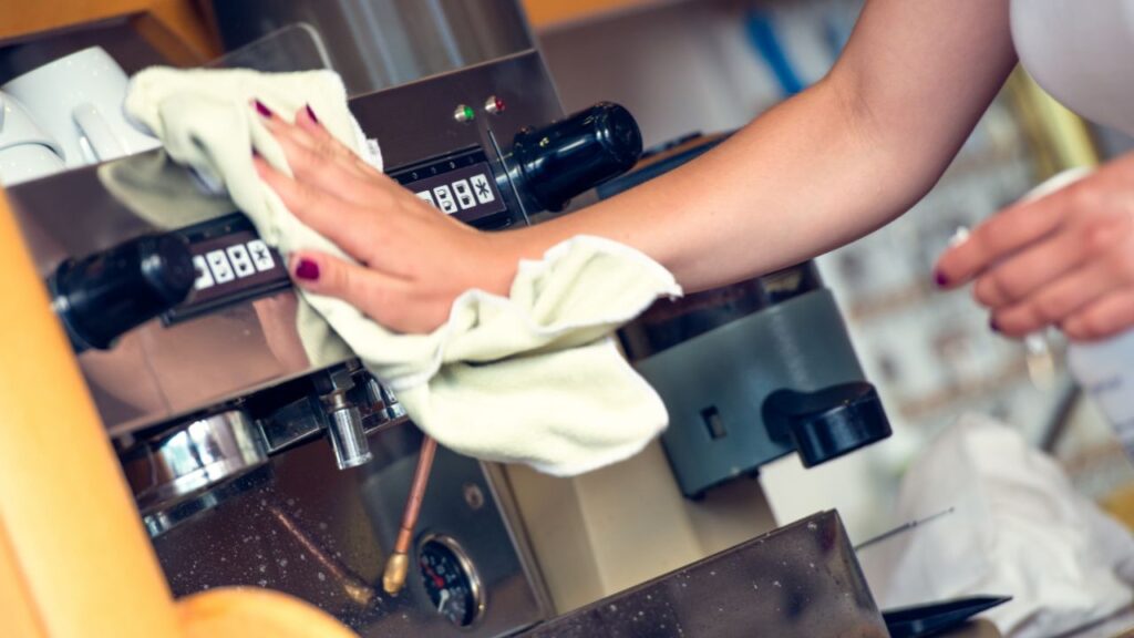 cleaning coffee machine with cloth