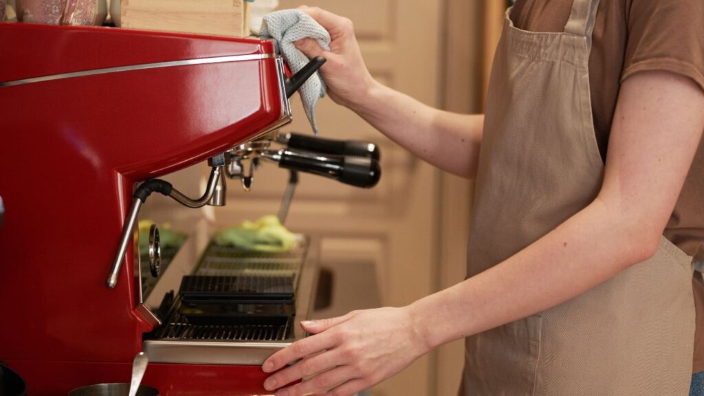 cleaning exterior of a coffee machine