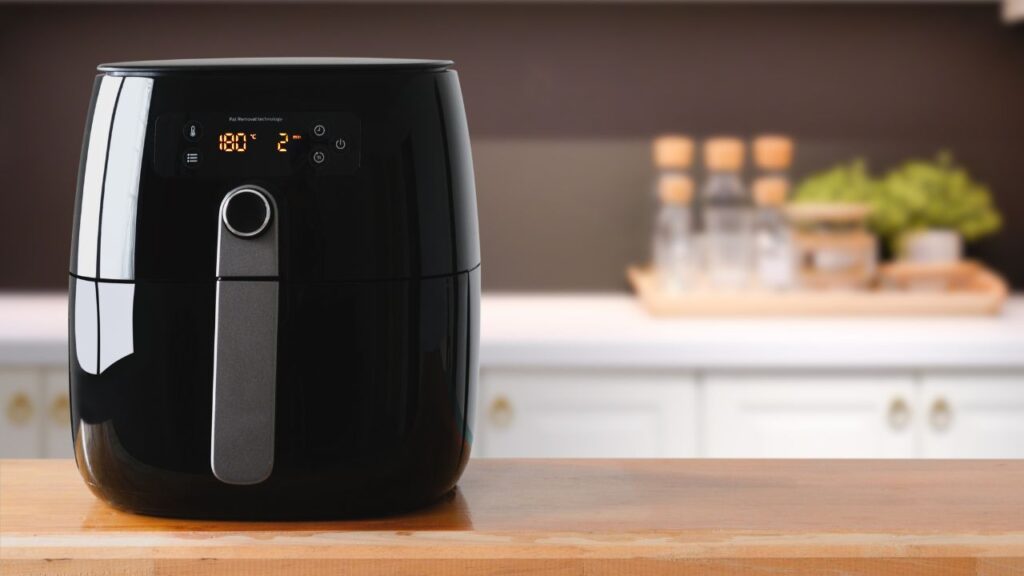 black air fryer on top kitchen counter