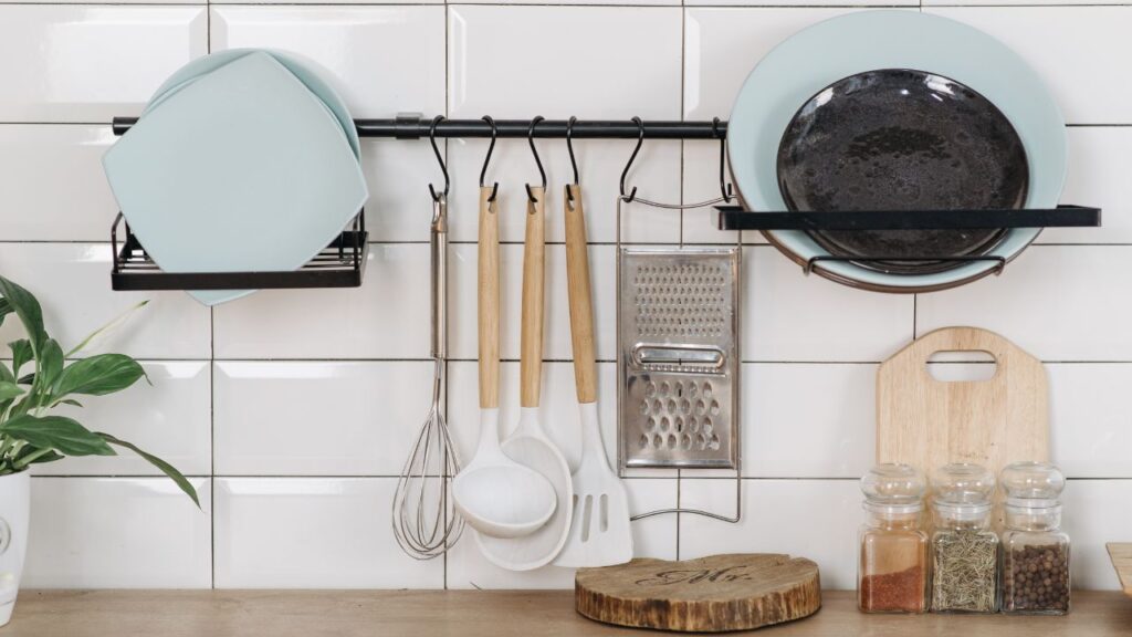 hanging kitchen utensils on wall