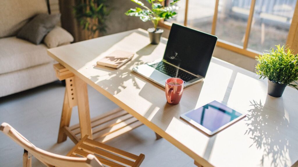 home office desk in front of a window